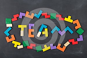 Teamwork creative concept concept jigsaw on the blackboard