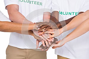 Teamwork with hands together standing