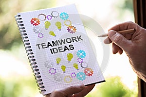 Teamwork idea concept on a notepad