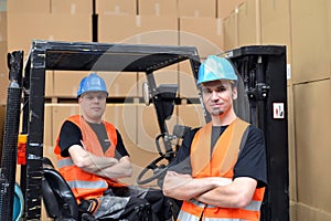 Teamwork in logistics - group of workers in a department store w