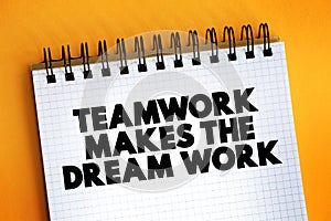 Teamwork Makes The Dream Work text on notepad, concept background