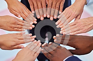 Teamwork, office and hands of business people in circle for community, support and collaboration. Diversity, corporate