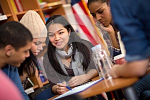 Teamwork of students working on task together photo
