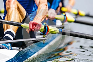 Teamwork symbolized rower s hands on oar in sync with partner, capturing olympic games spirit photo