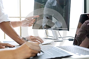 Teamwork team programmer working with computer