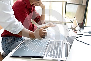 Teamwork team programmer working with computer