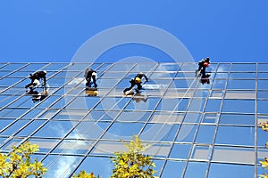 Teamwork - window cleaners at work