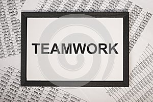 Teamwork word in businessman hands. Concept of working together in community