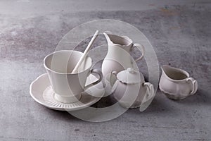 Teapot creamer, Cup and saucer on Cement Board