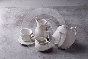 Teapot creamer, Cup and saucer on Cement Board