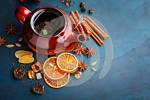 Teapot with dry tea photo