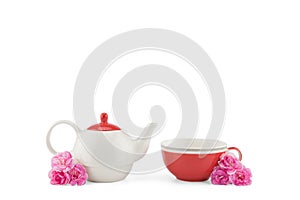 Teapot and red tea cup