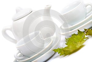 Teapot and white teacup