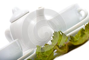 Teapot and white teacup