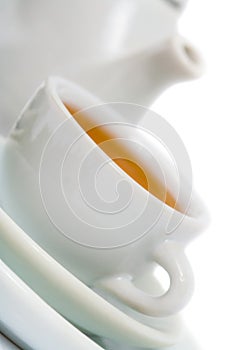 Teapot and white teacup