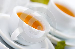 Teapot and white teacup