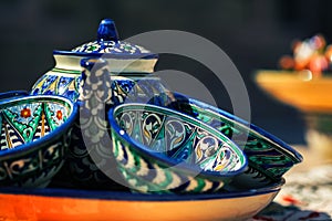 Teapots with cups photo