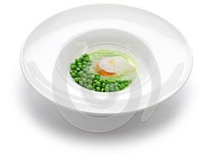 Tear peas with poached egg, spanish basque cuisine photo