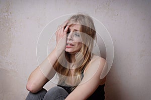 Tear-stained young woman