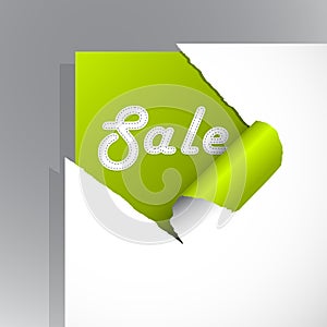 Teared paper with Sale sign.