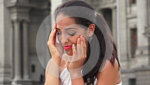 Tearful Stressed Young Hispanic Woman