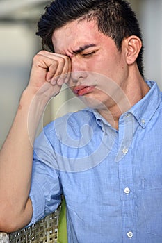 Tearful Young Asian Male Man