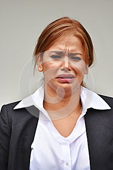 Tearful Young Business Woman Wearing Suit