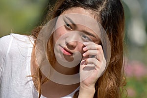 Tearful Young Filipina Person