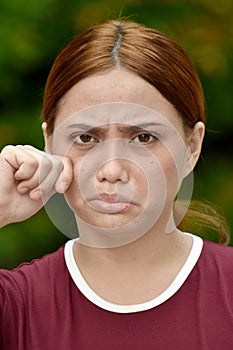 A Tearful Youthful Redhead Female Adult