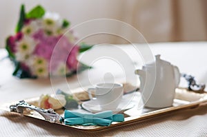 Teaset on breakfast tray in bedroom