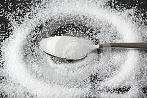 A teaspoon full of white sugar