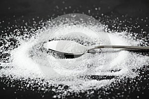 A teaspoon full of white sugar