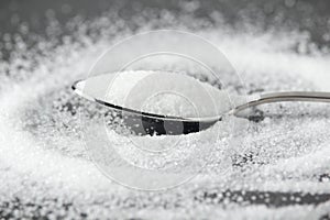 A teaspoon full of white sugar