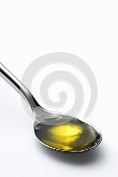 Teaspoon of olive oil photo