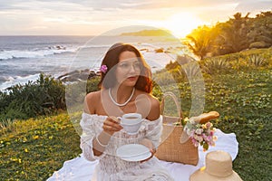 Teatime Boho Breakfast Picnic with Romantic Woman in White Dress