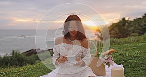 Teatime Boho Breakfast Picnic with Romantic Woman in White Dress