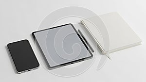 Tech accessories and notebook isolated on white background
