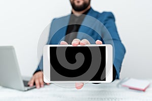 Tech Guru Selling Newly Developed Device, Teacher Confiscating Phone, Businessman Presenting Technological Advancement photo