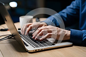 Tech savvy typing mans hands proficiently operate PC keyboard