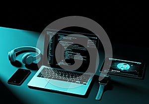 A laptop displaying code on its screen, suggesting programming or