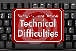 Technical Difficulties message on a black keyboard