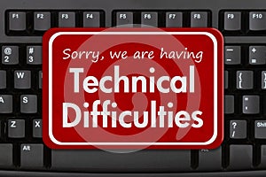 Technical Difficulties message on a black keyboard photo