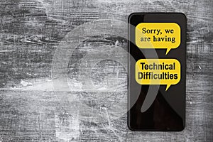 Technical Difficulties message on a black mobile phone