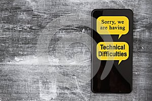 Technical Difficulties message on a black mobile phone photo