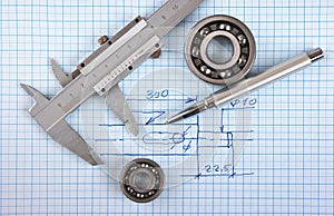 Technical drawing and callipers photo