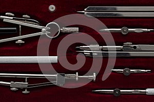 Technical drawing tools in special dark red velvet case
