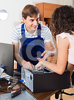 Technical engineer upgrading hardware of client computer