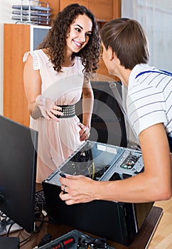 Technical engineer upgrading hardware of client computer