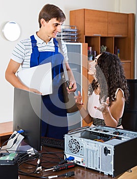 Technical engineer upgrading hardware of client computer