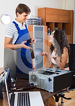 Technical engineer upgrading hardware of client computer